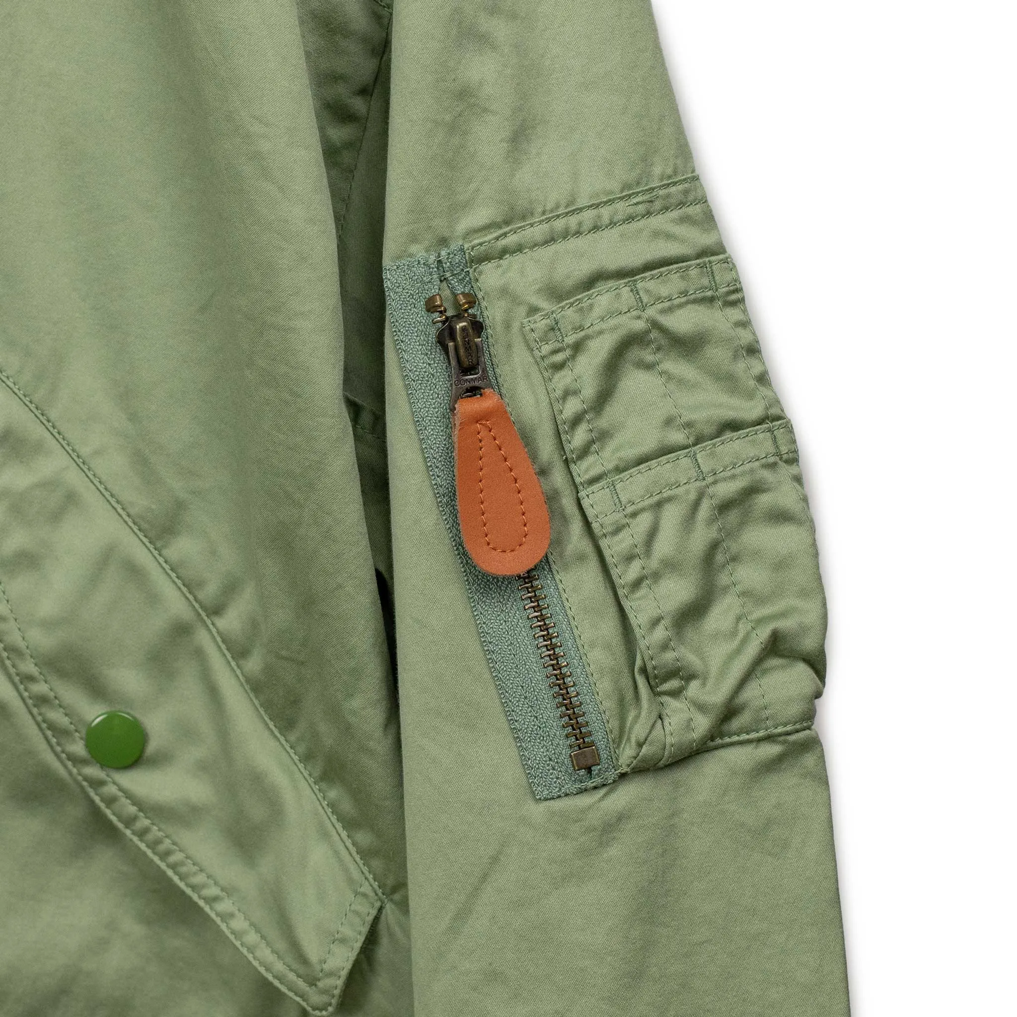 Relaxed military bomber in sage cotton sateen